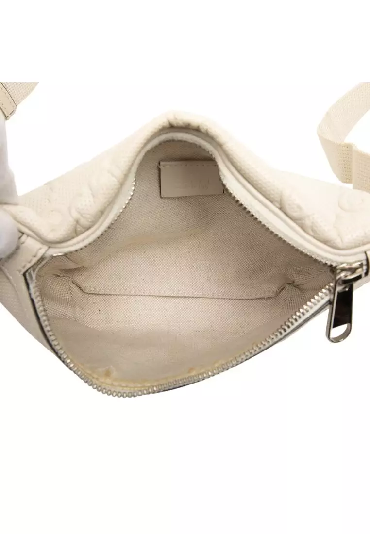 Pre-Loved Gucci Gg Embossed Perforated Leather Belt Bag