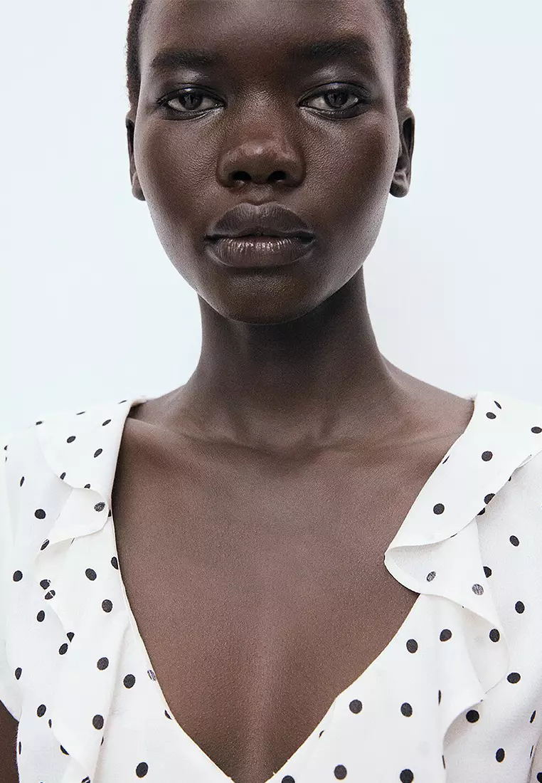 Polka-Dot Blouse With Ruffles