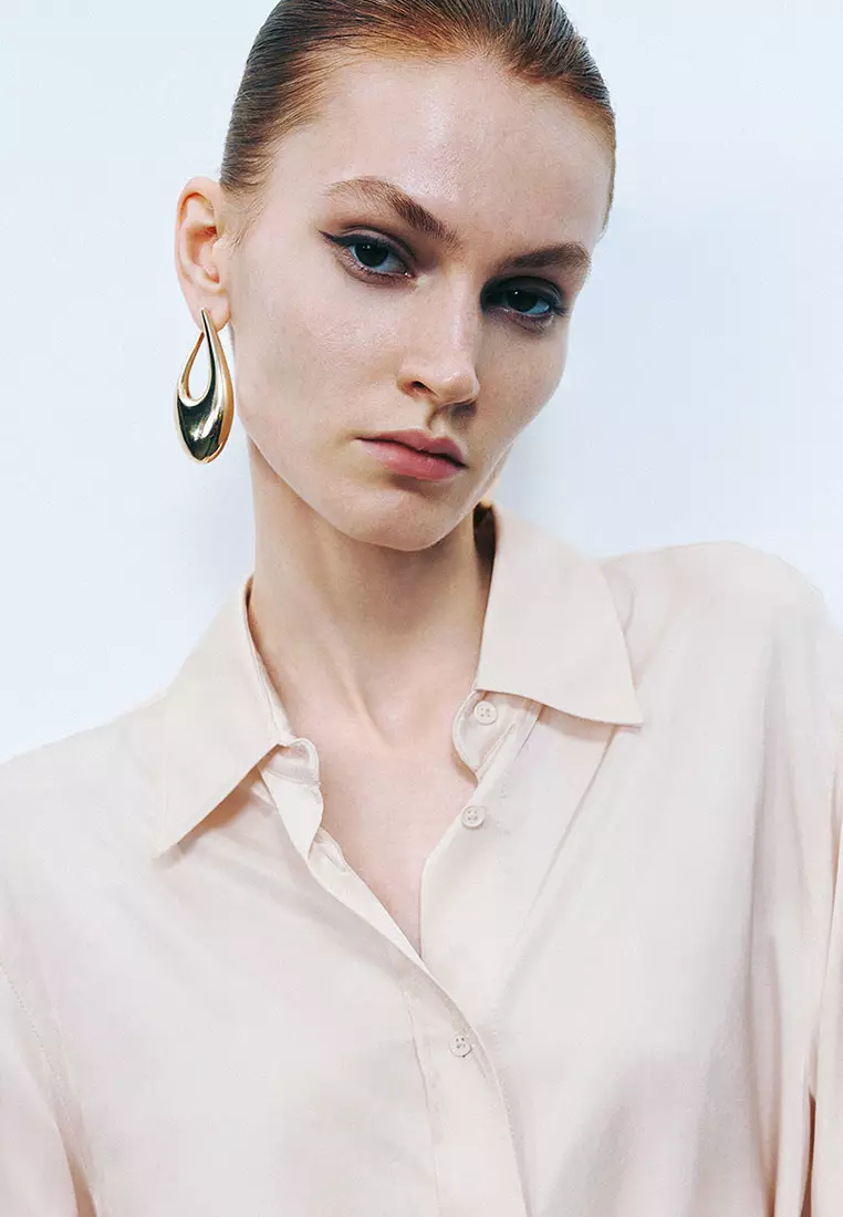 UR秋季新款女装都市通勤气质开衩长袖开襟衬衫UWG240172