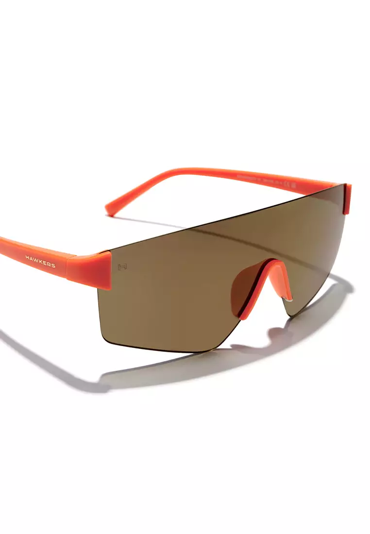HAWKERS Orange Beige Aero Sunglasses For Men And Women, Unisex. Official Product Designed In Spain