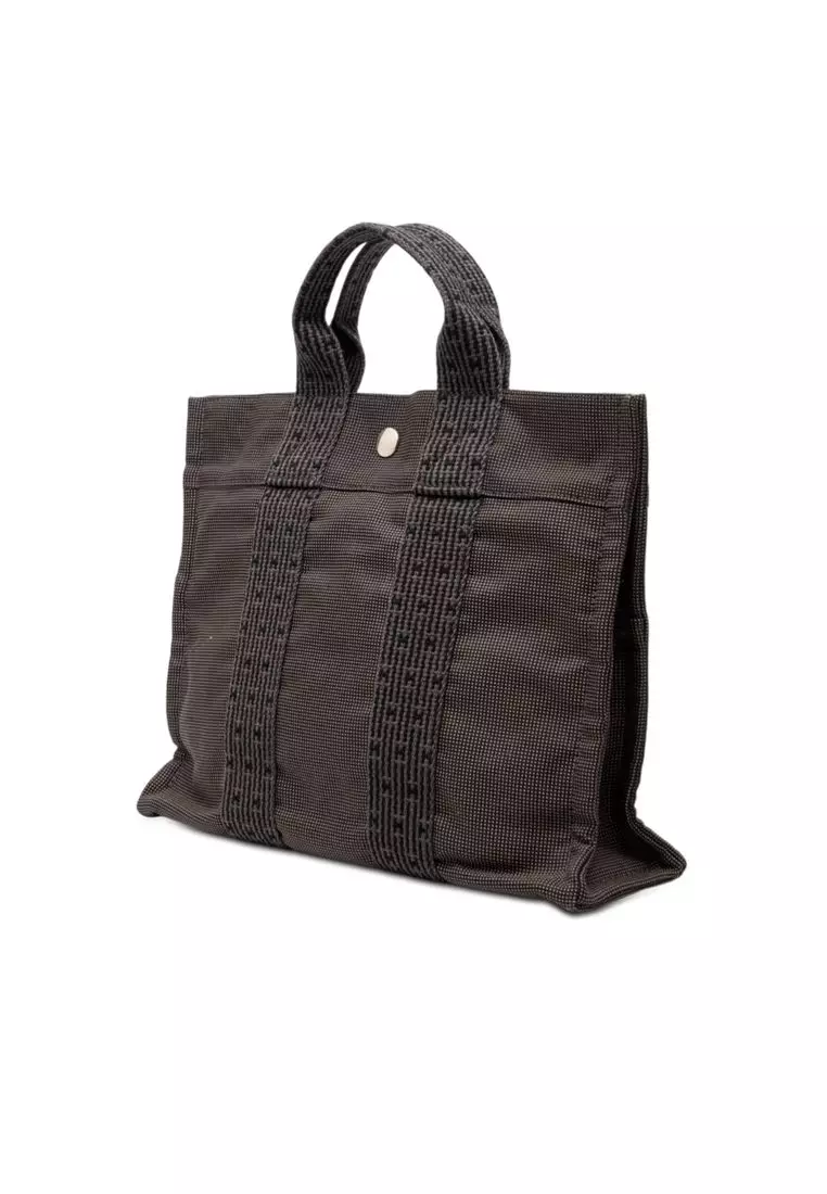 Pre-Loved Hermès Canvas Herline Pm