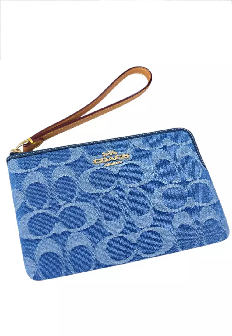 Buy COACH Large Corner Zip Wristlet In Signature Denim - Indigo