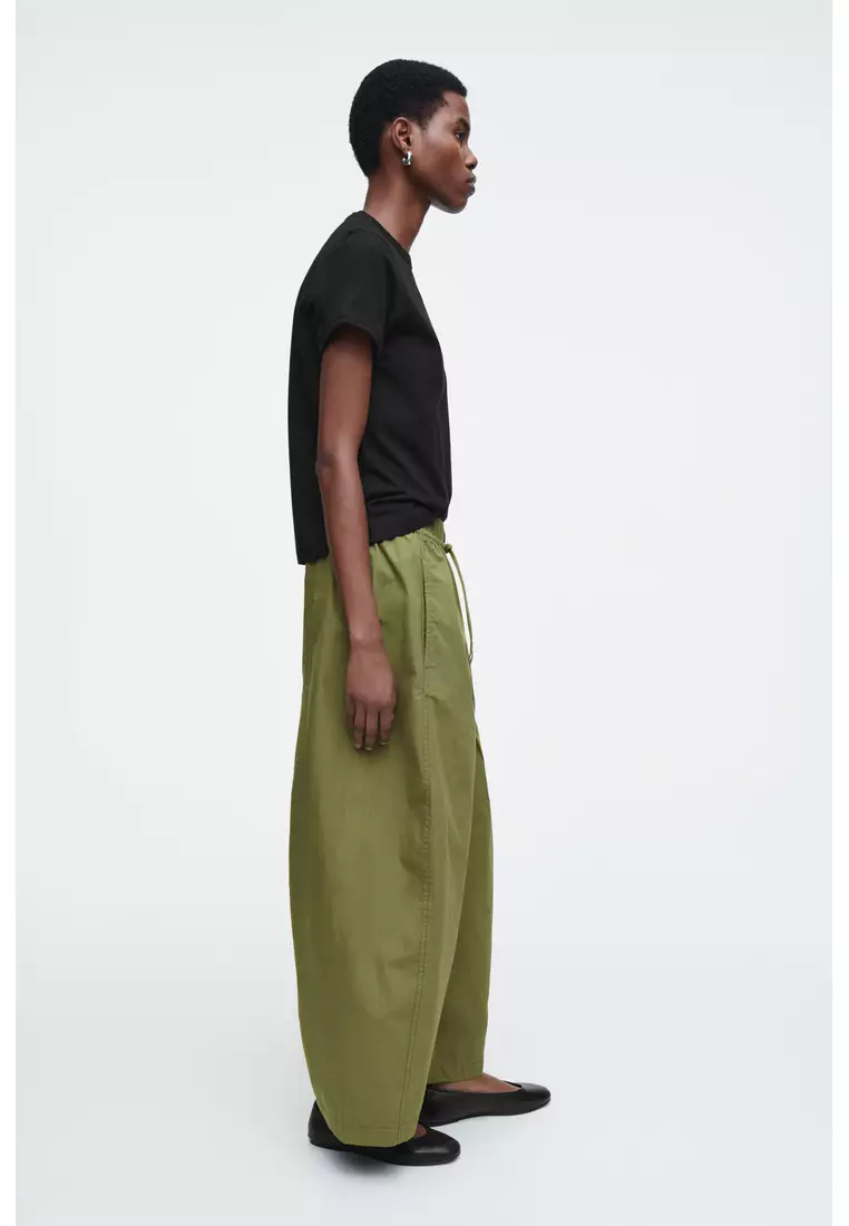 ELASTICATED BARREL-LEG TROUSERS