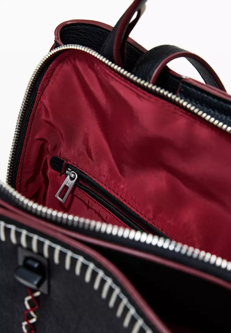 Large faux leather effect backpack with topstitching