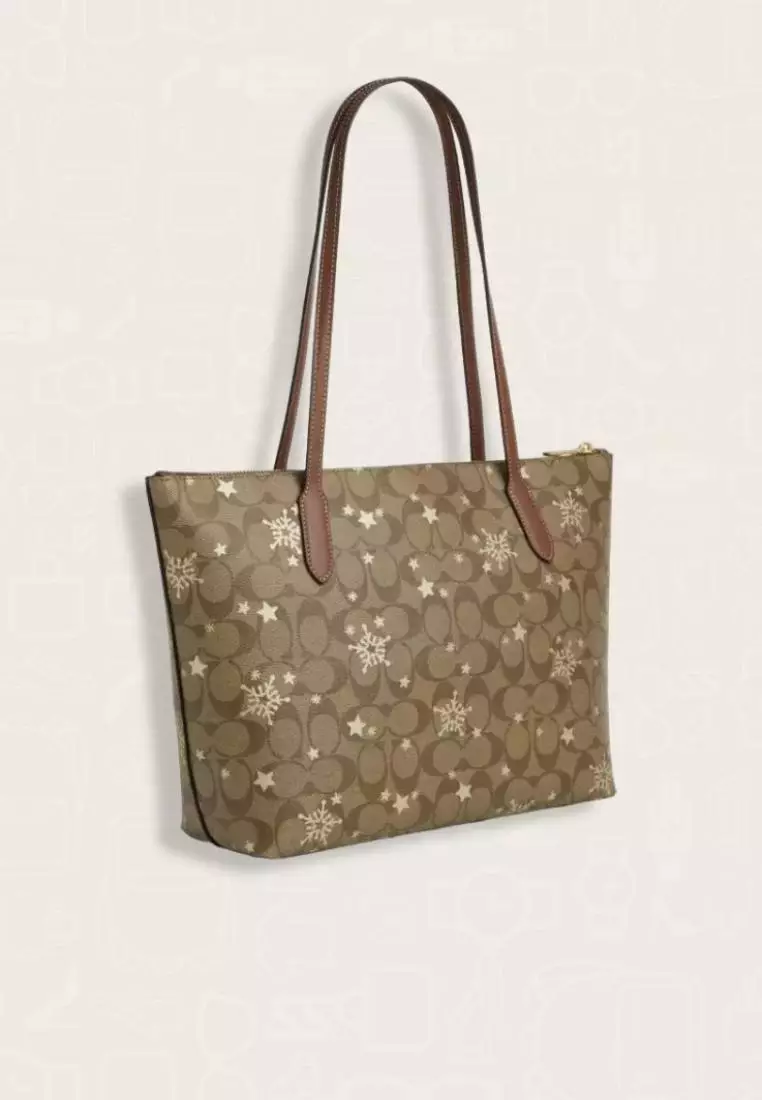 Coach Zip Top Tote In Signature Canvas With Star And Snowflake Print Khaki Saddle Gold Multi