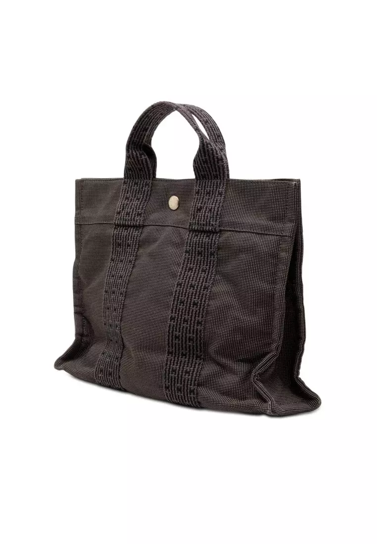 Pre-Loved Hermès Canvas Herline Pm