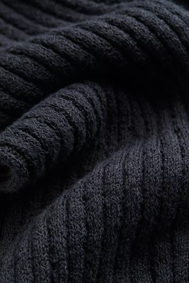 Flared rib-knit trousers