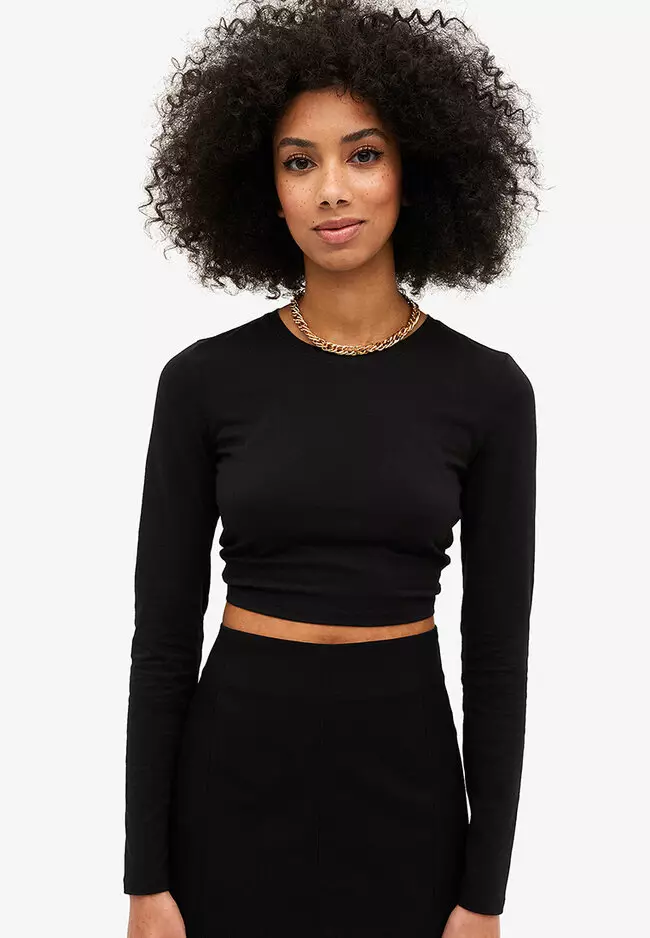 Buy Monki Long Sleeve Crop Top With Cut Out Back in Black Dark
