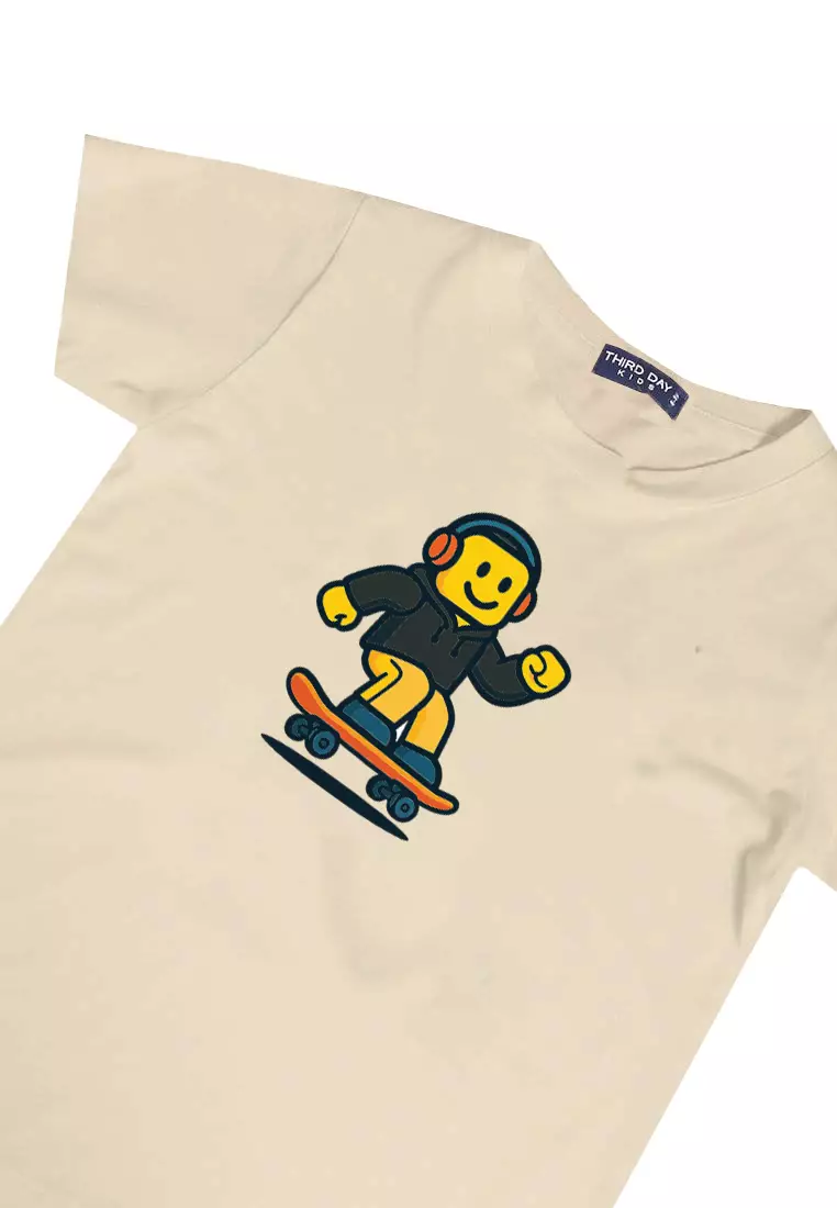KU149 Kaos Anak Instacool "lego skate" light cream