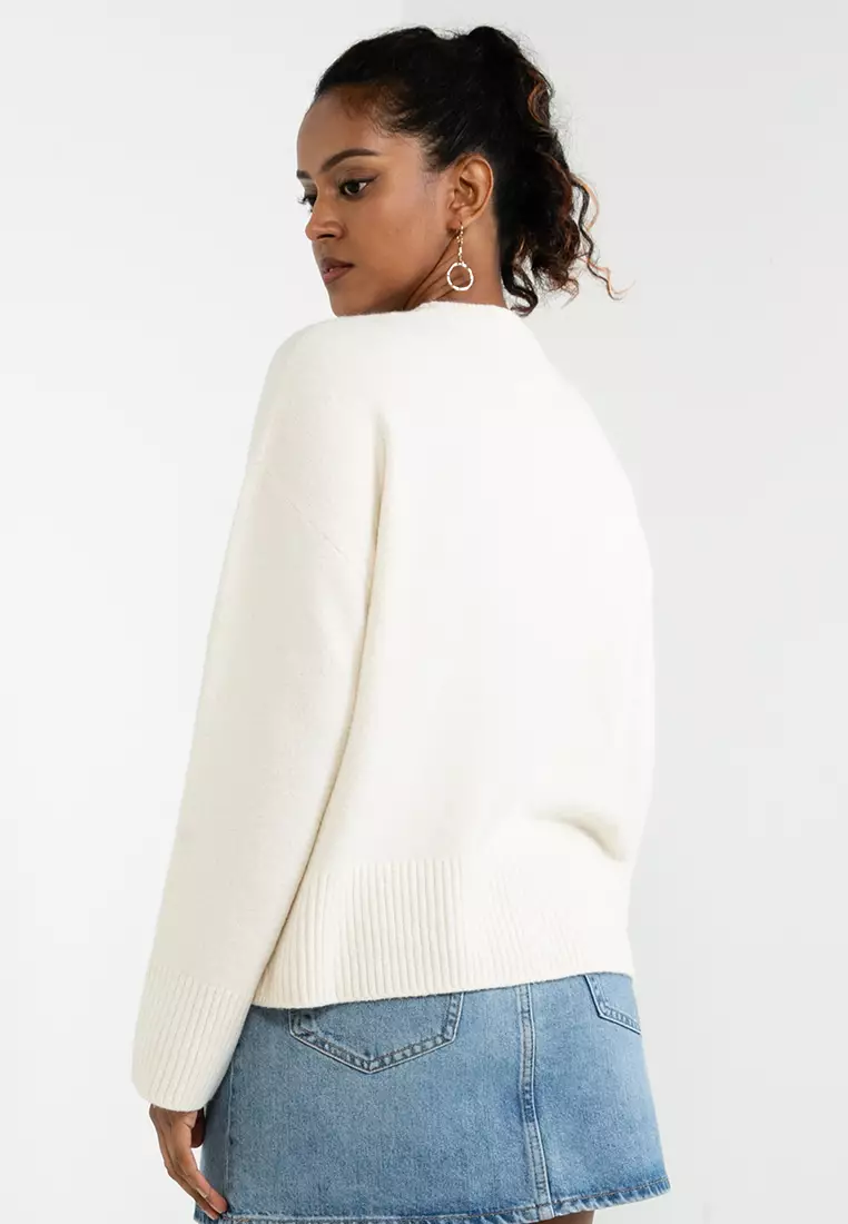 White wooly jumper on sale