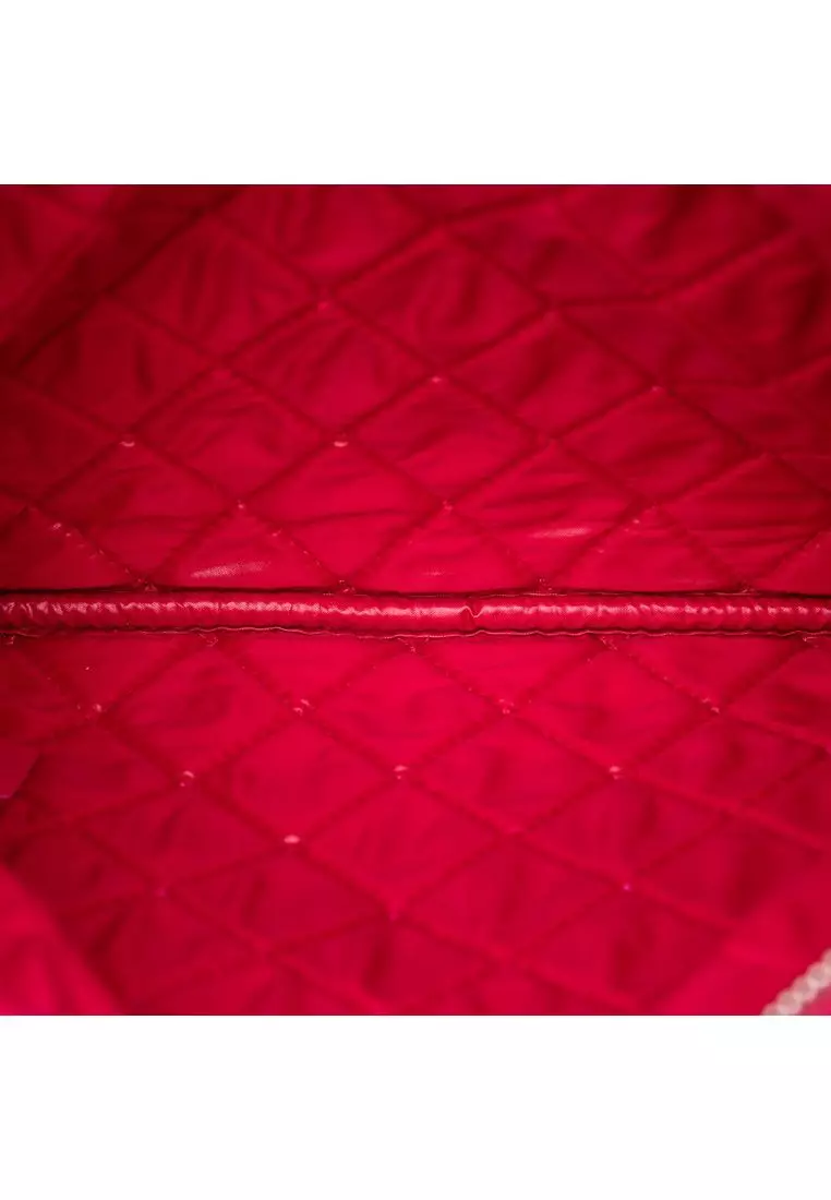 Pre-Loved Chanel Small Quilted Patent O Case Clutch