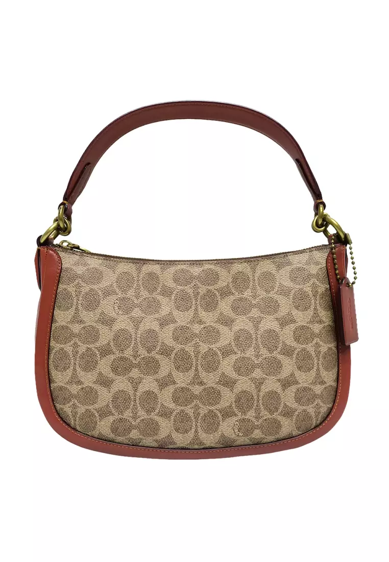 Coach sutton crossbody sales in signature canvas