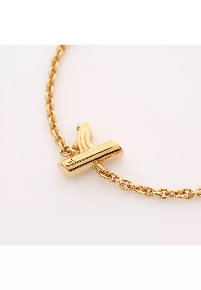 Louis Vuitton LV & Me Letter V Gold Tone Bracelet Louis Vuitton