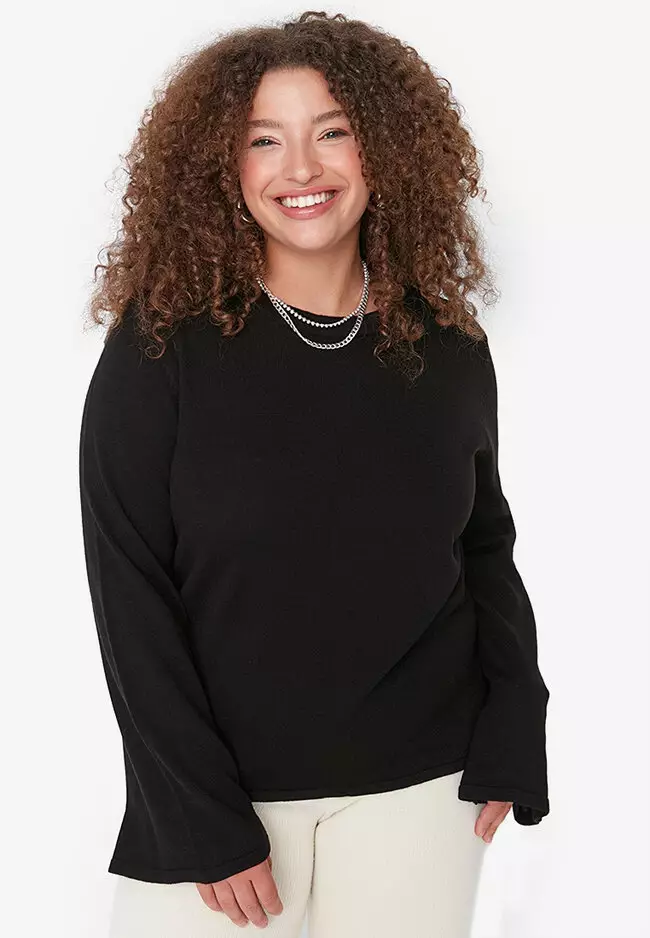 Jumper with store flared sleeves