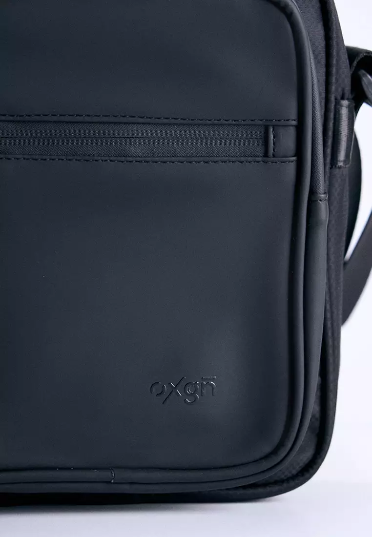 Multi Compartment Water Repellent Sling Bag