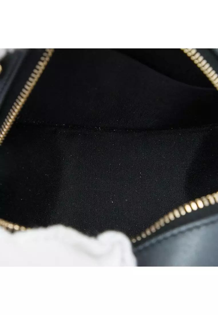 Pre-Loved Chanel Cc Quilted Iridescent Lambskin Pearl Round Clutch With Chain