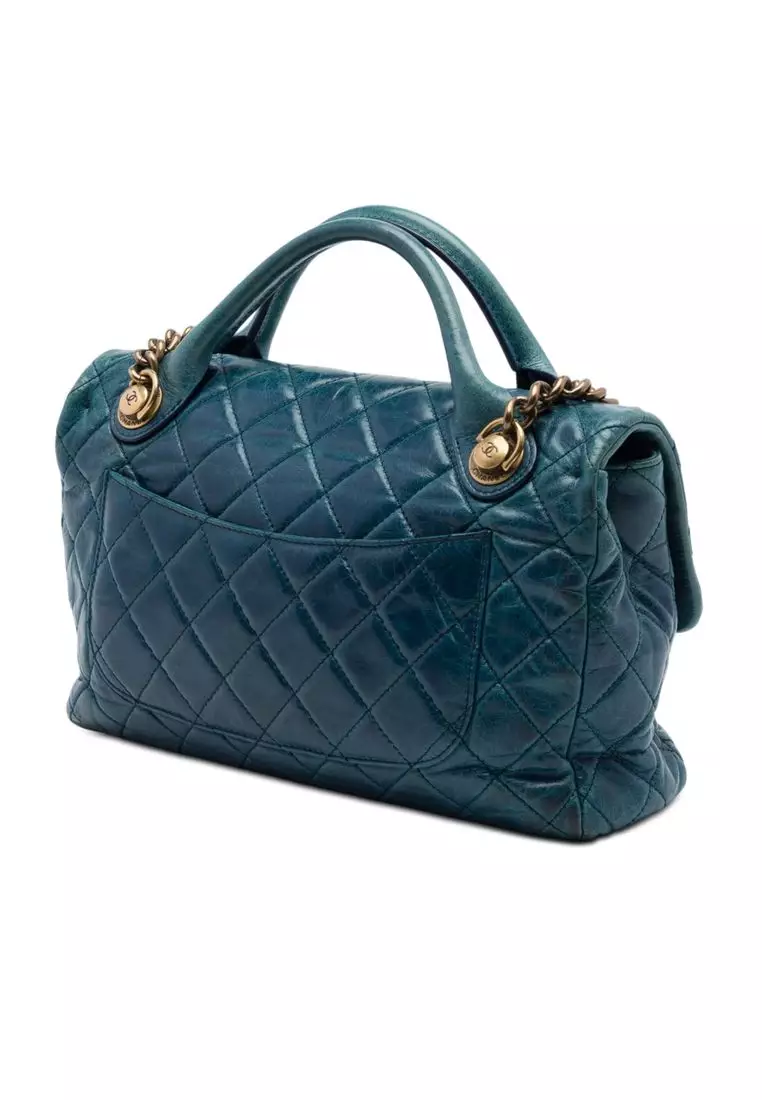 Pre-Loved Chanel Medium Glazed Calfskin Castle Rock Top Handle Flap