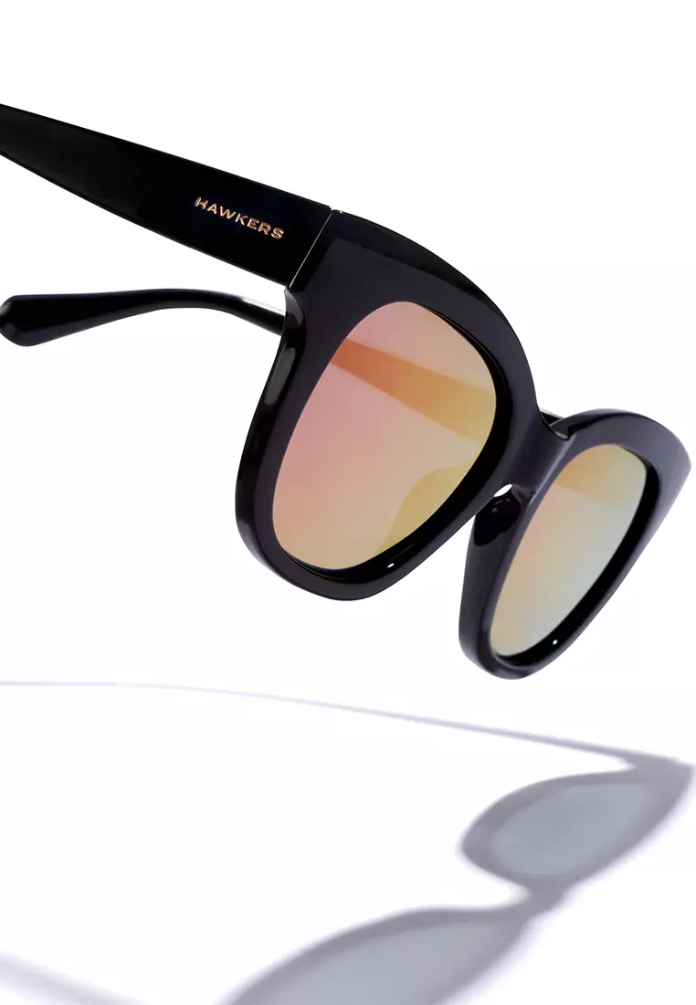 HAWKERS Audrey Neuve Polarized Black Pink Sunglasses For Men And Women, Unisex. Official Product Designed In Spain