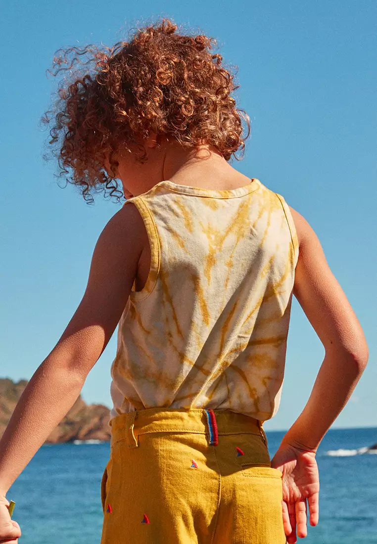 MUSTARD AND WHITE TIE AND DYE TANK TOP WITH JERSEY SHARK MOTIF