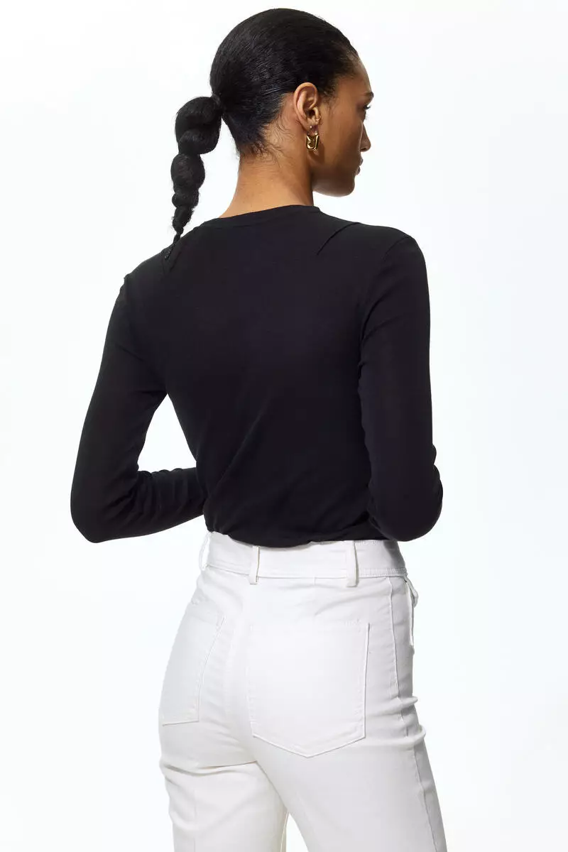 Flared ankle-length trousers