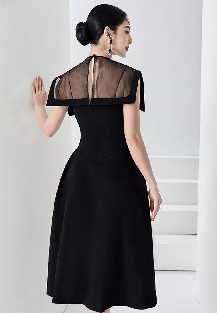 Sleeveless dress with shawl top