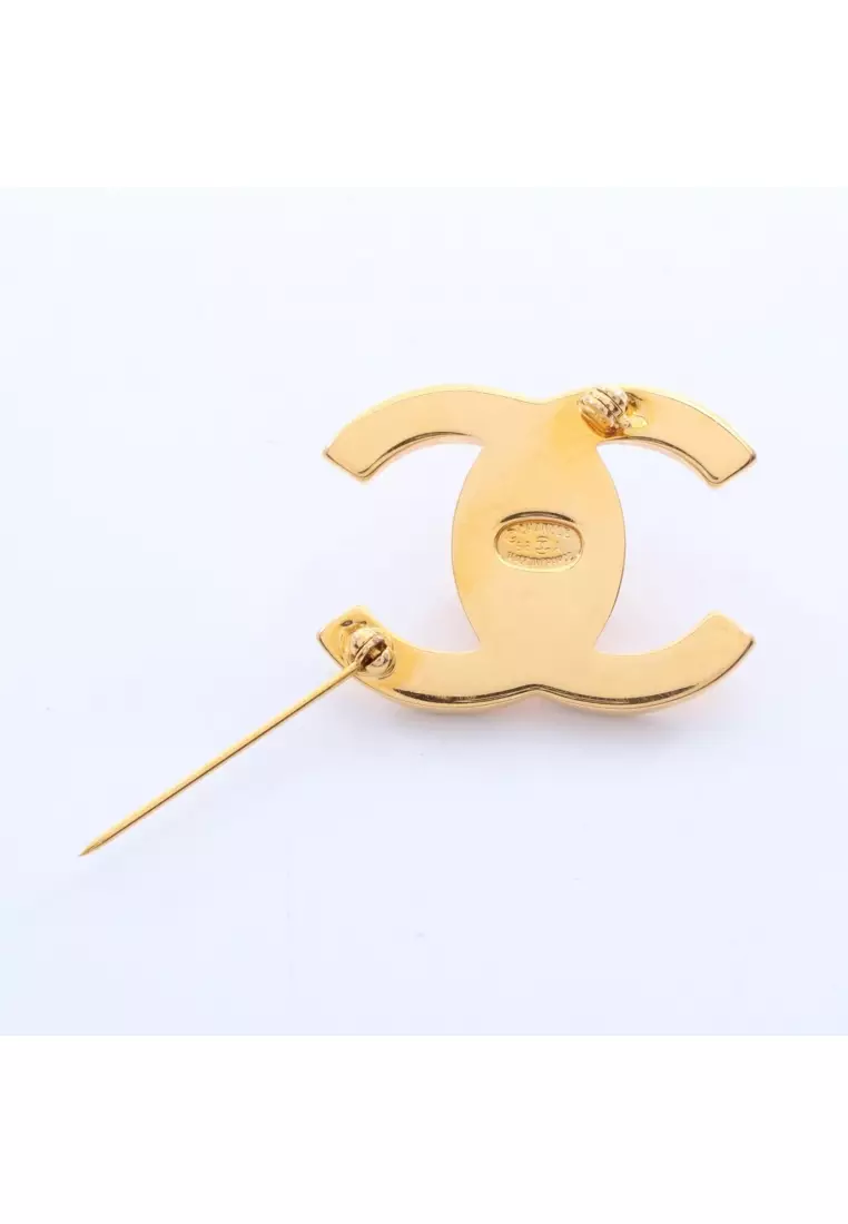 Pre-Loved Chanel coco mark turn lock motif brooch GP gold 96A