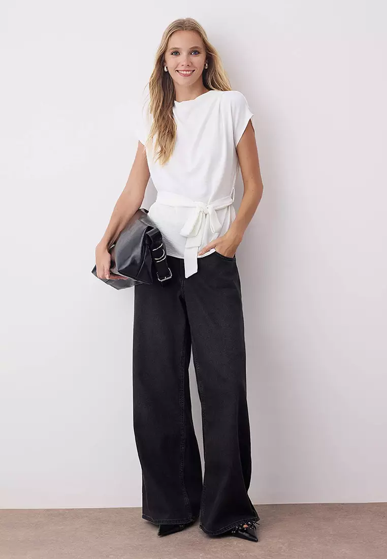 White Sleeveless Belted Woven Blouse