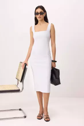 white formal dress philippines Make an entrance they won't forget with our halter neck midi dress,  complete with a subtle gold-toned accent, perfect for gala nights, formal  dinners, or any moment you want to shine. Available