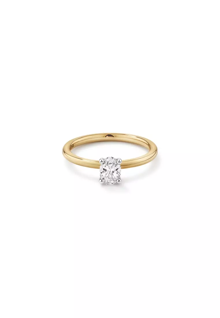 Gold solitaire diamond top ring