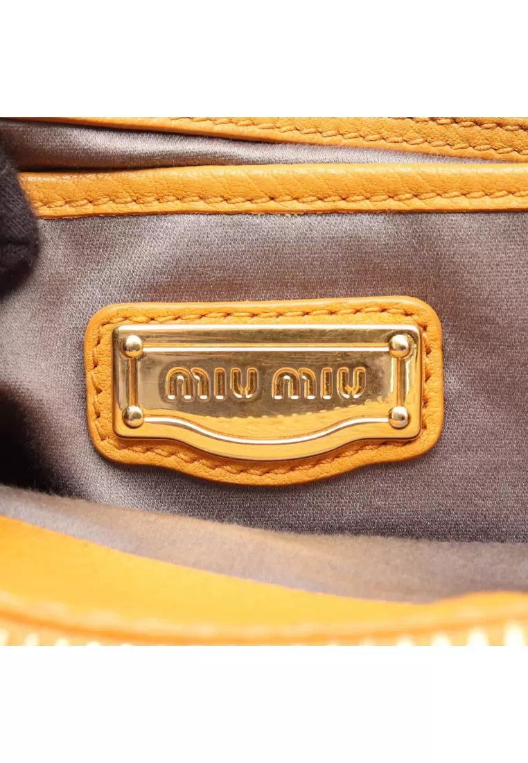 Pre-Loved MIU MIU VITELLO CARIBU Vitello Caribu Handbag leather yellow 2WAY