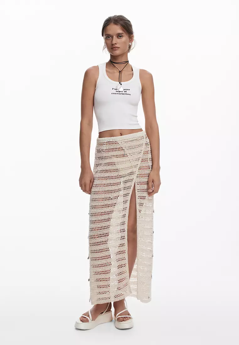 Eyelet wrap dress with appliqués