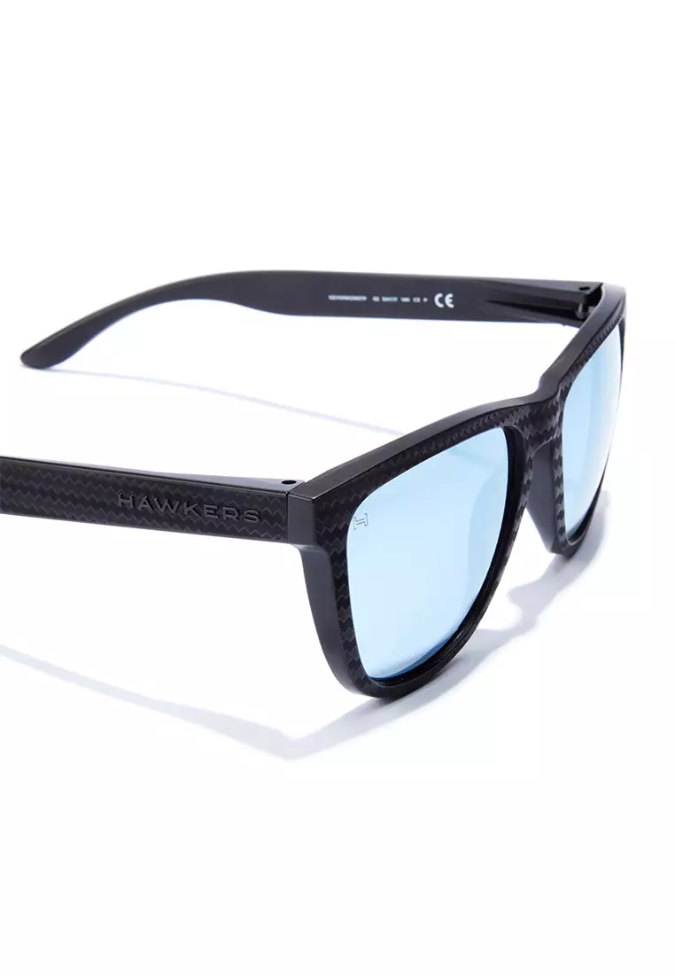 HAWKERS POLARIZED Blue Chrome ONE CARBONO RAW. Sunglasses for Men and Women, Unisex. UV400 protection. Official product designed and made in Spain. HONR21NSTP