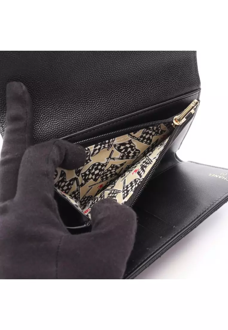 Pre-Loved Chanel matelasse trifold wallet Caviar skin black gold hardware