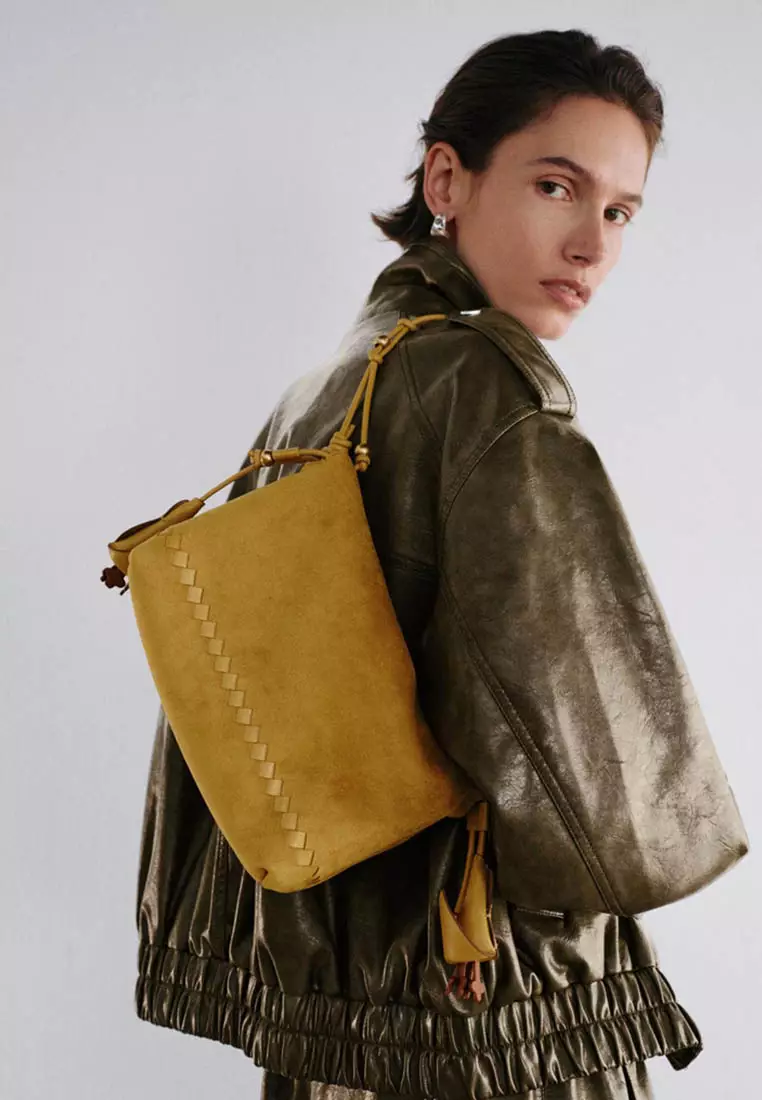 Buy Urban Revivo Suede Drawstring Woven Tassel Charm Shoulder Bag 2026 ...