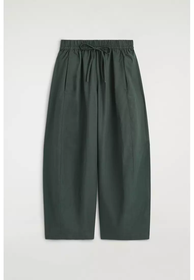 ELASTICATED BARREL-LEG TROUSERS