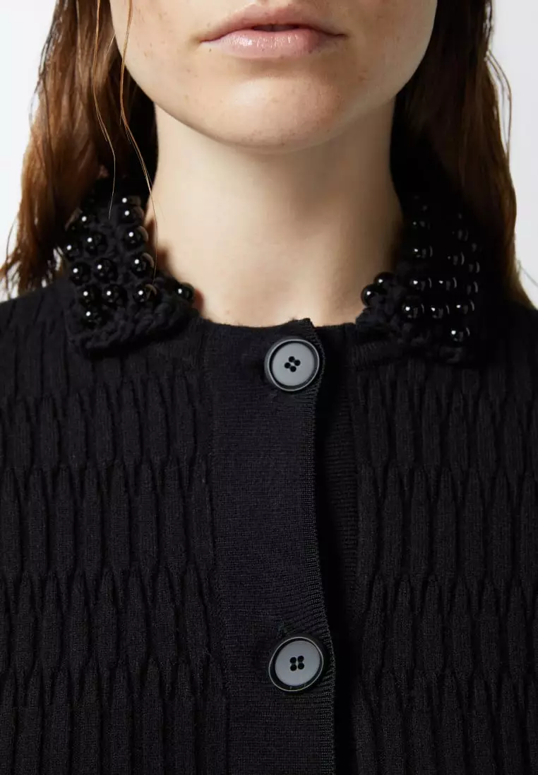 Short knit jacket with beaded crocheted collar