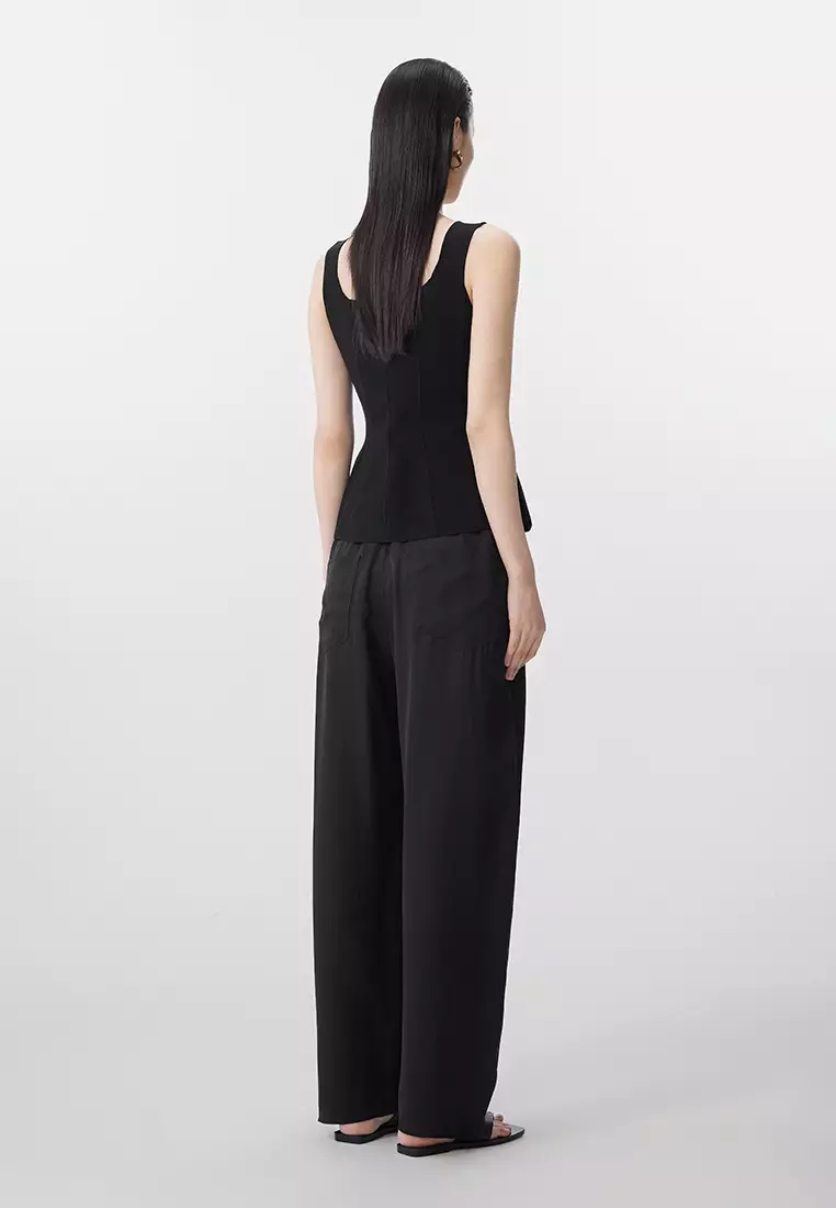 Curled extra-long trousers
