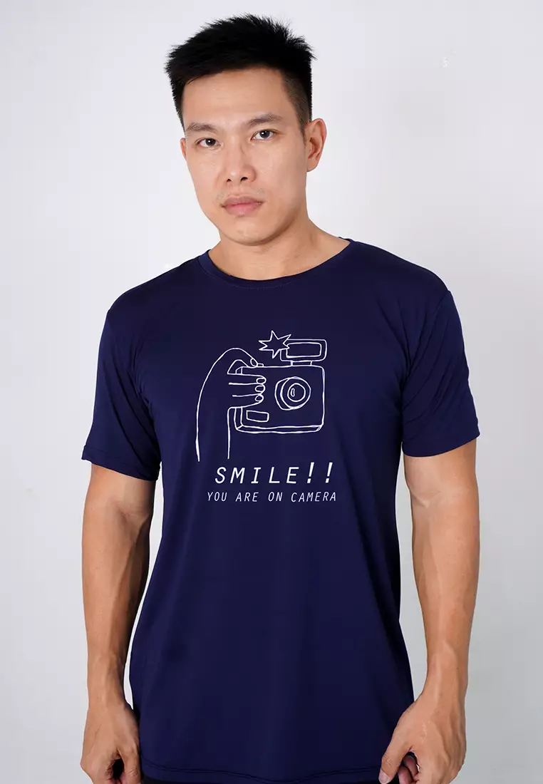 NTC49 kaos anti kusut distro anime kartun smile you are on camera navy