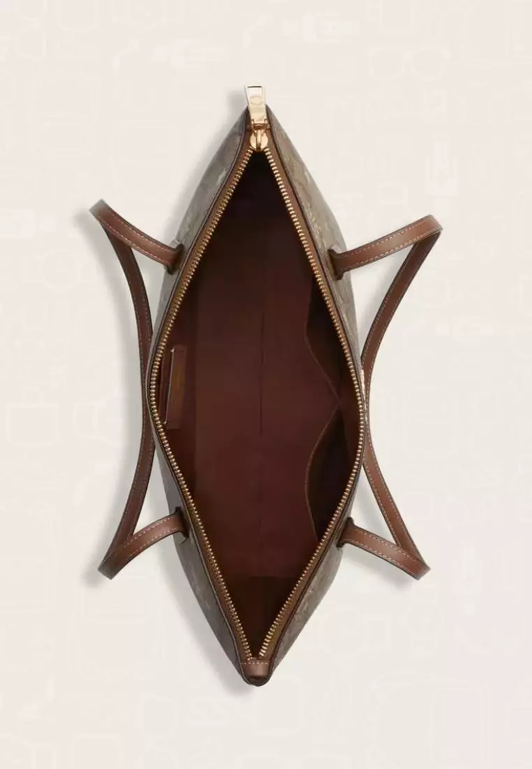 Coach Zip Top Tote In Signature Canvas With Star And Snowflake Print Khaki Saddle Gold Multi