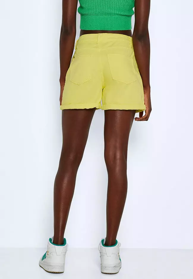 neon yellow denim shorts