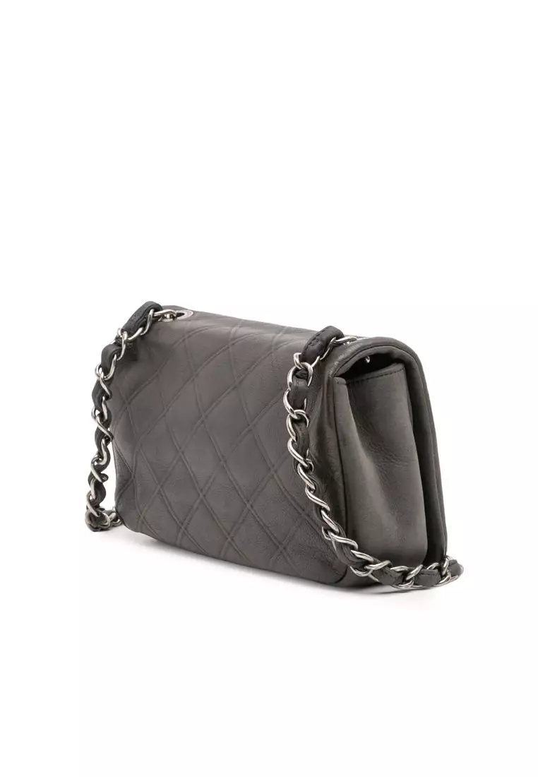 Pre-Loved Chanel Diamond Embossed Calfskin New Chic Flap