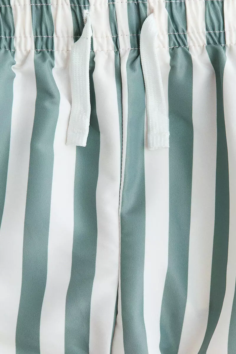 Patterned swim shorts