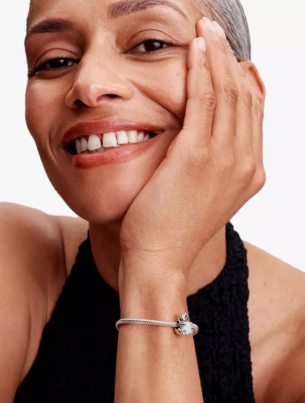 Polar bear sterling silver charm with white lab-created opal and black enamel