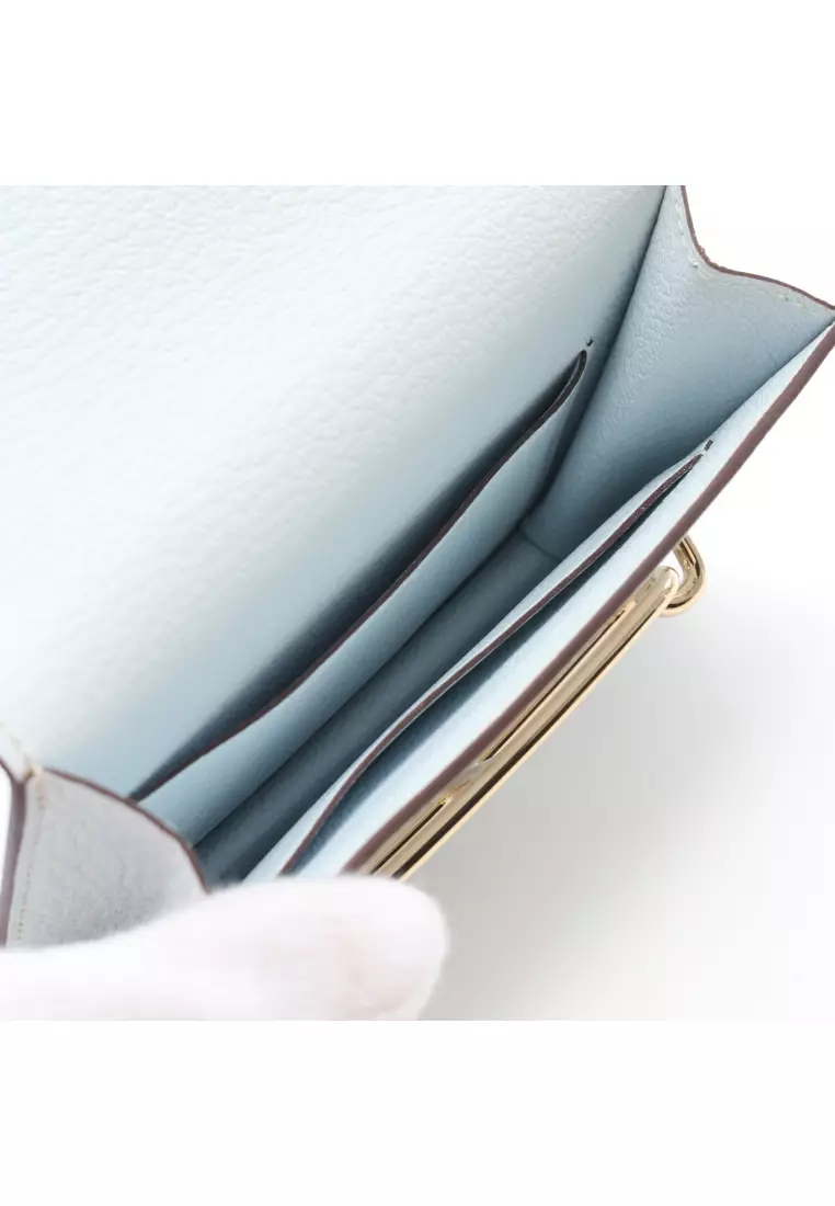 Pre-Loved Hermès Lawris Ruri slim Bi-fold wallet Chevre Light blue gold hardware Z stamp