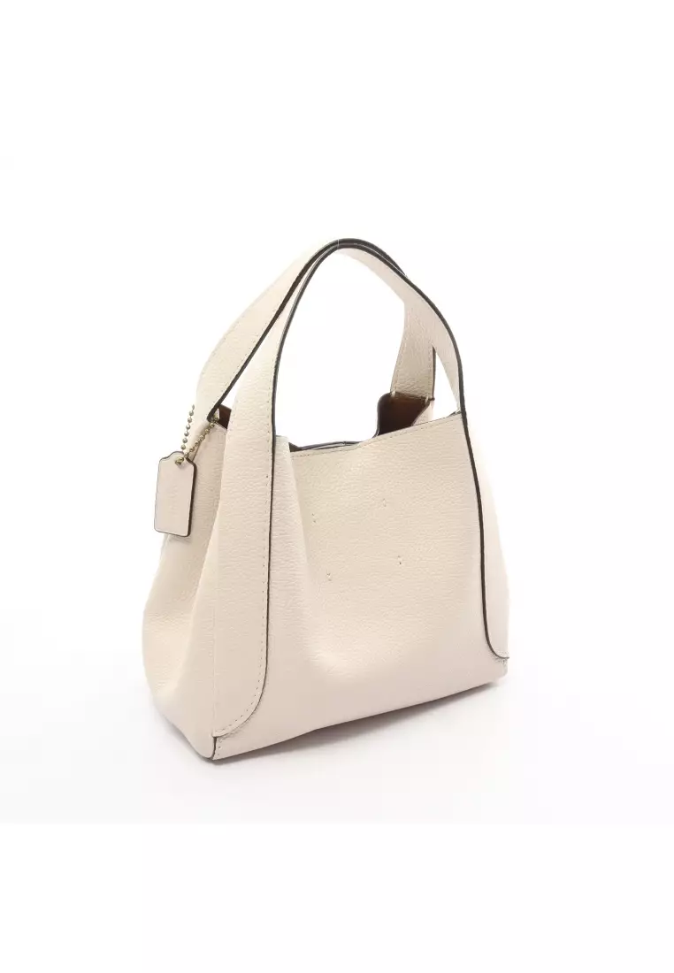 網上選購Coach 二奢Pre-loved Coach Hadley Hobo 21 Handbag leather off white 2WAY  2024 系列| ZALORA香港