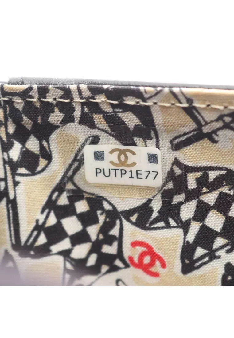 Pre-Loved Chanel matelasse trifold wallet Caviar skin black gold hardware
