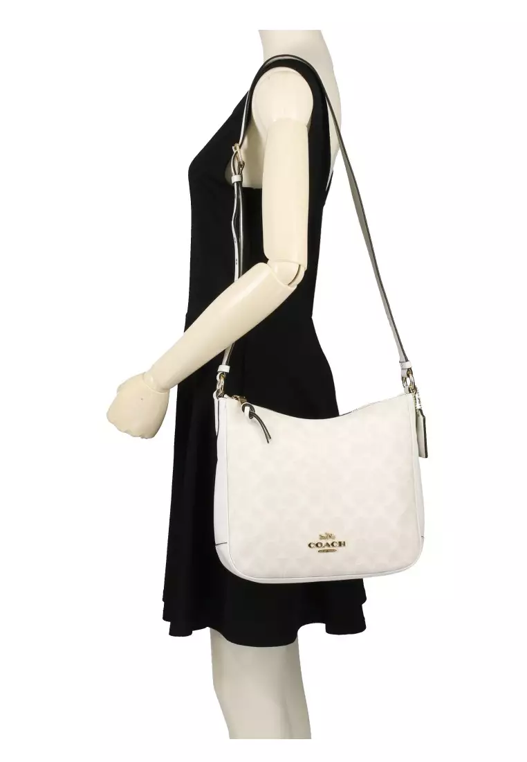 Buy Coach Coach Ellie File Bag In Signature Canvas White 2024