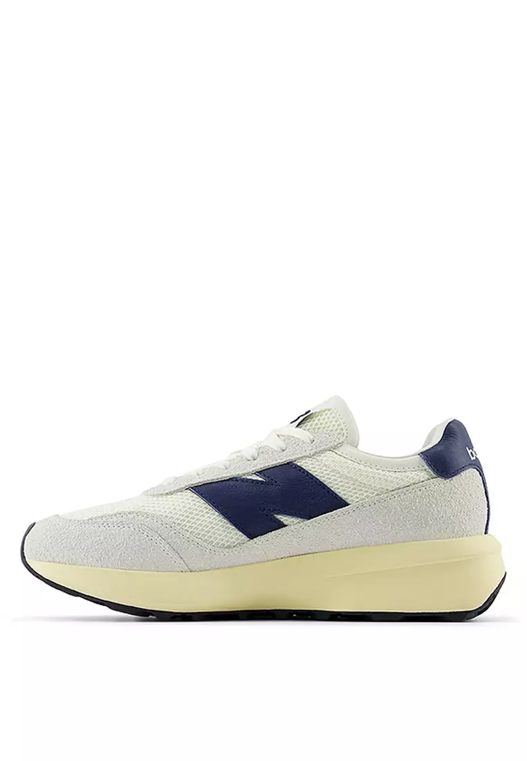 New balance 370 trainers in black online