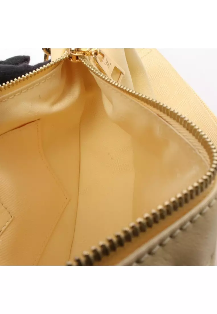 Pre-Loved Louis Vuitton over- The moon bubble glam banana chain handbag leather Light yellow