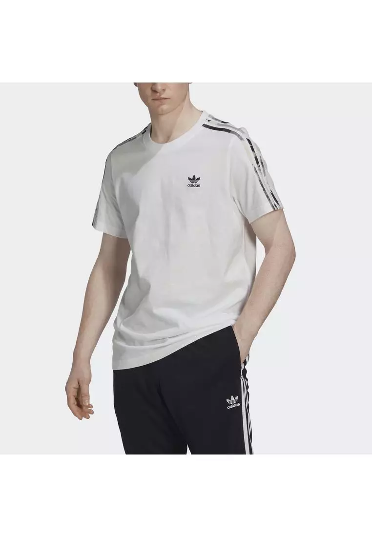 Adidas originals jersey hotsell shorts in camo